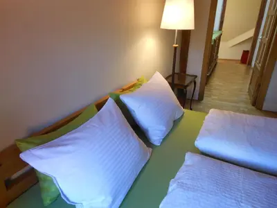 two pillows sitting on a bed in a room at Daukanto Apartments in Vilnius