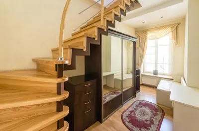 a staircase in a home with wooden floors at Central apartments 3 x Free parking x SELF CHECK-IN in Vilnius