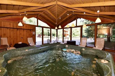 a large jacuzzi tub in a house at Aerodream Trakai in Antakalnis