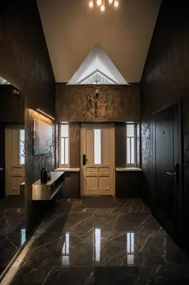 a large room with a door and a window at Senamiesčio apartamentai in Anykščiai
