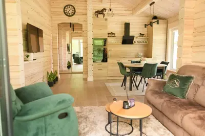a living room with a couch and a table at 