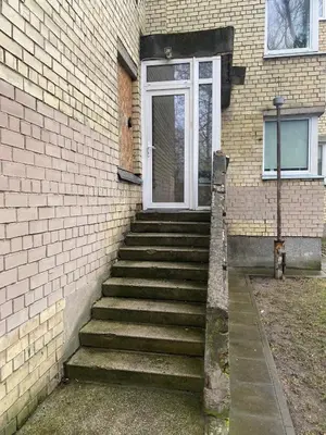 a set of stairs leading up to a door at Modern & Cozy Gem - Spacious Central Retreat with private entrance in Vilnius
