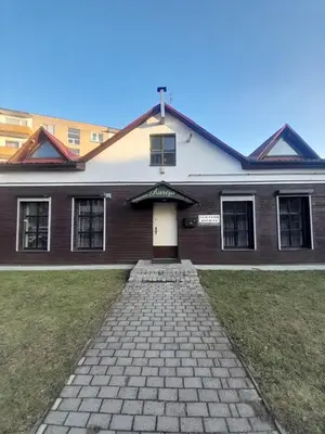 a house with a brick driveway in front of it at Svečių namai Aurėja in Kėdainiai