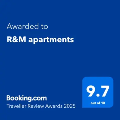 a blue text box with the words awarded to rrm appointments at R&M apartments in Kaunas