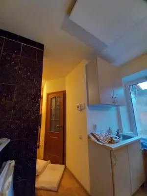 a kitchen with a sink and a counter top at MAIRONIO gt 19-7 in Vilnius
