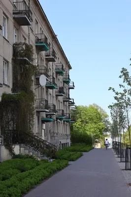 a building with balconies on the side of it at Butas Šiaulių mieste in Šiauliai