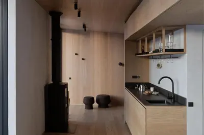 a kitchen with a sink and a stove at Konga Stay L in Aluona