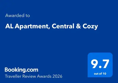 a blue sign that says all appointment central and cozy at AL Apartment, Central & Cozy in Panevėžys