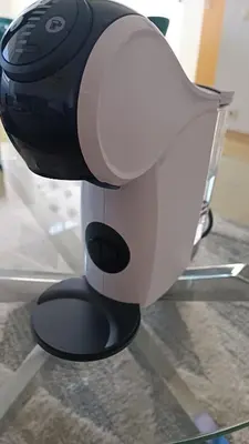 a hair dryer sitting on top of a stand at Fox studio apartment in Šiauliai
