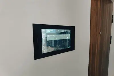 a flat screen tv on a white wall at Brand new apartment in Vilnius center. in Vilnius