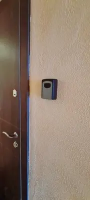 a door with a handle on a wall at Apartments in Šiauliai city center in Šiauliai