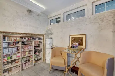 a room with two chairs and a table in it at LOCUSDO Apartment no. 137 near OZAS, AKROPOLIS in Vilnius
