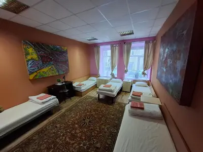 a room with a bunch of beds in it at Jamaika @ Shopen in Vilnius