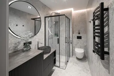 a bathroom with a shower and a toilet and a mirror at No. 1 PARK AVENUE APARTMENT in Kaunas