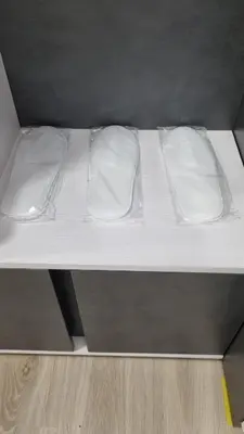a bed with white sheets and pillows on it at Trumpalaike buto nuoma in Rokiškis