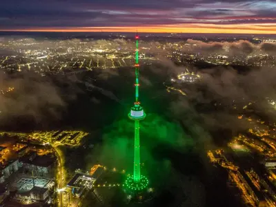 a view of the cn tower at night at Tower View Apartment in Vilnius