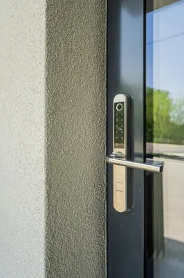 a door with a cell phone sticking out of it at Riverra House - Two-bedroom Apartment in Kaunas