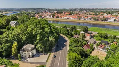 an aerial view of a town with a river at Riverra House - Studio Panorama View in Kaunas