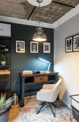 an office with a desk and a chair at Barber Apartment in Kaunas