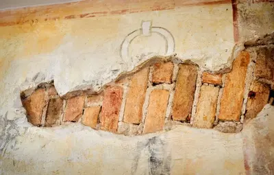 a painting of a building on a wall at Old Town Apartments FREE Parking in Vilnius