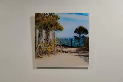a picture of a yellow bike parked next to a fence at Great location STUDIO1 on the first floor, 24h self check-in in Kaunas