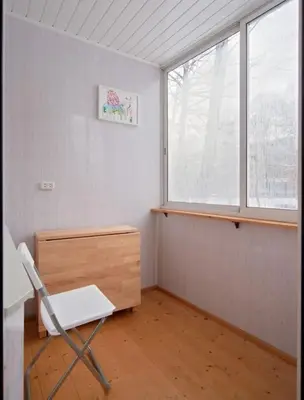 a room with a chair and a desk and a window at ☆ Perfect Spot Apartment ☆ everywhere in 10 min. in Vilnius
