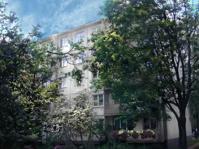 a large white building with trees in front of it at ☆ Perfect Spot Apartment ☆ everywhere in 10 min. in Vilnius