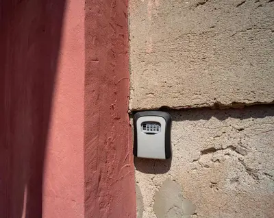 a brick wall with an electrical box on it at Cozy Loft next to Main Station in Kaunas