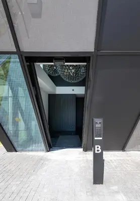 a building with a sign in the middle of a hallway at Panoramic View 1 BD Apartment by Domvia in Kaunas
