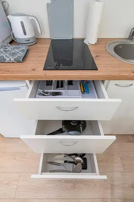 a desk with a laptop on top of it at Partizanų studio apartment #3 by Polo Apartments in Kaunas