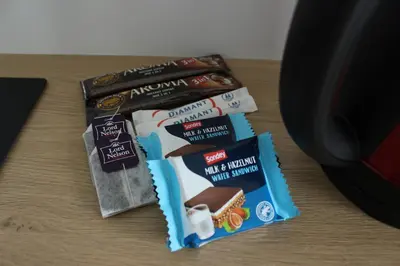 a group of snacks sitting on top of a table at Gedimino 19 apartments in the old town of Ukmergė in Ukmergė