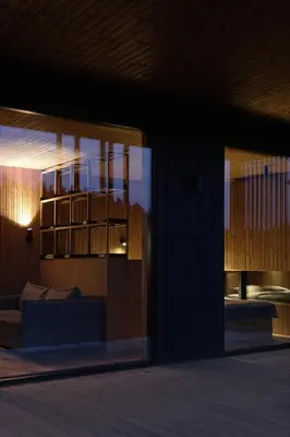 a living room with a couch and a window at Konga Stay M - Private Jacuzzi Included in Strakiškiai