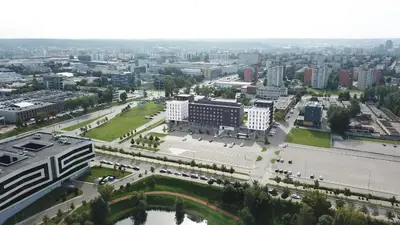 an aerial view of a city with buildings at Scandinavian style apartment in Vilnius