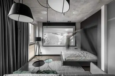 a bedroom with a bed and a painting on the wall at Boutique Studio with Free Parking & AC in Kaunas