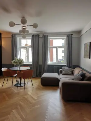 a living room with a couch and a table at Saviciaus in Vilnius
