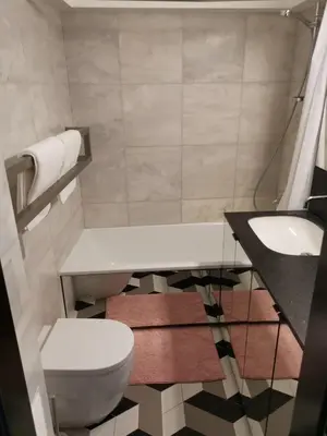 a bathroom with a toilet and a sink at Saviciaus in Vilnius