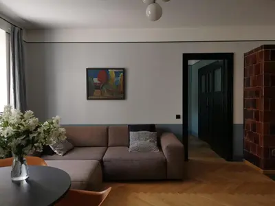 a living room with a couch and a table at Saviciaus in Vilnius