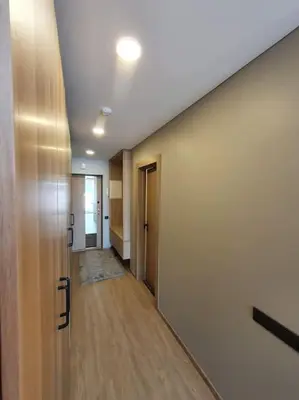 an empty hallway of an office building with a hallway at Cozy flat 911 in Vilnius