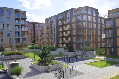 a rendering of a courtyard with apartment buildings at Cozy apartment located near to Paupys in Vilnius