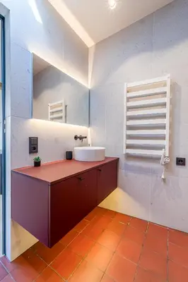 a bathroom with a sink and a mirror at Jazz Old Town apartment with AC in Kaunas