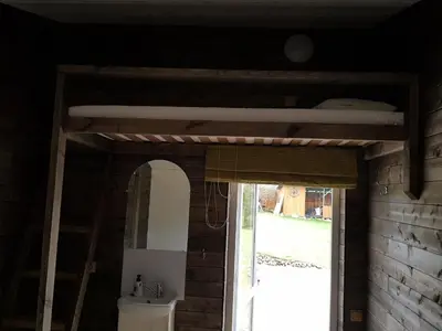 a doorway into a room with a window at Merkioaidas in Sližiūnai