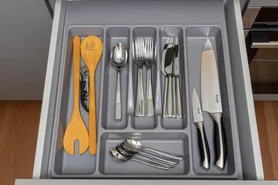 a tray filled with utensils in a drawer at cohost I New Apt w-Balcony I Air Condition I Free Parking & Netflix I By Botanical Park in Kaunas