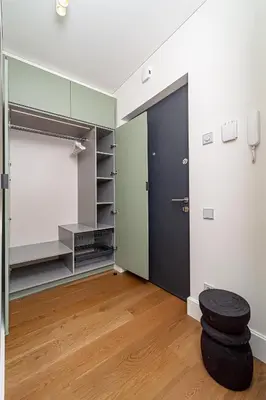 a room with a closet with a tire in it at cohost I New Apt w-Balcony I Air Condition I Free Parking & Netflix I By Botanical Park in Kaunas