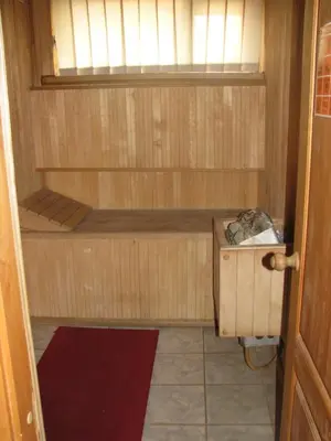 a small sauna with a window in a room at Sveciu Namai Giles in Alytus