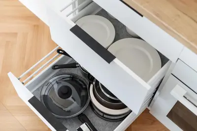 a washer and dryer in a kitchen drawer at Renaissance Apartments by Reside Baltic in Vilnius