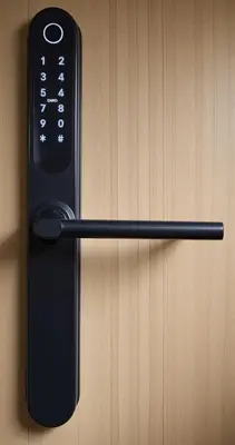 a remote control is attached to a wooden door at Cozy Family Apartments in Druskininkai