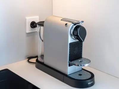 a mixer sitting on top of a counter at D33 Vilnius - Brand New Luxury Apartment with Terrace, Garden, AC and Parking in Vilnius