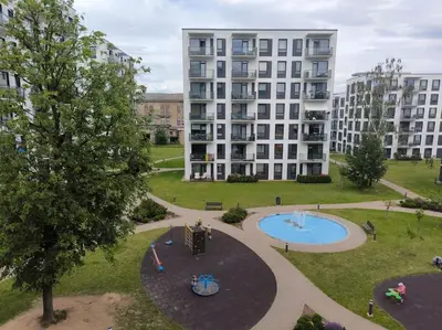 an aerial view of a park with a building at Modern Urban Retreat & Private Parking in Vilnius