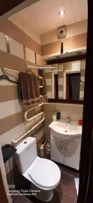 a small bathroom with a toilet and a sink at EirForce1 in Kaunas