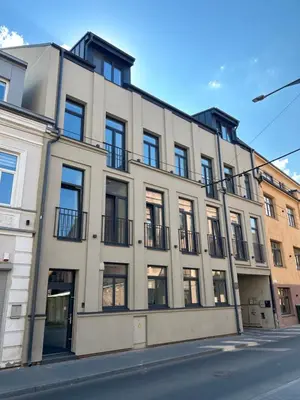 an apartment building on a city street at Studio 11 - old town Kaunas in Kaunas
